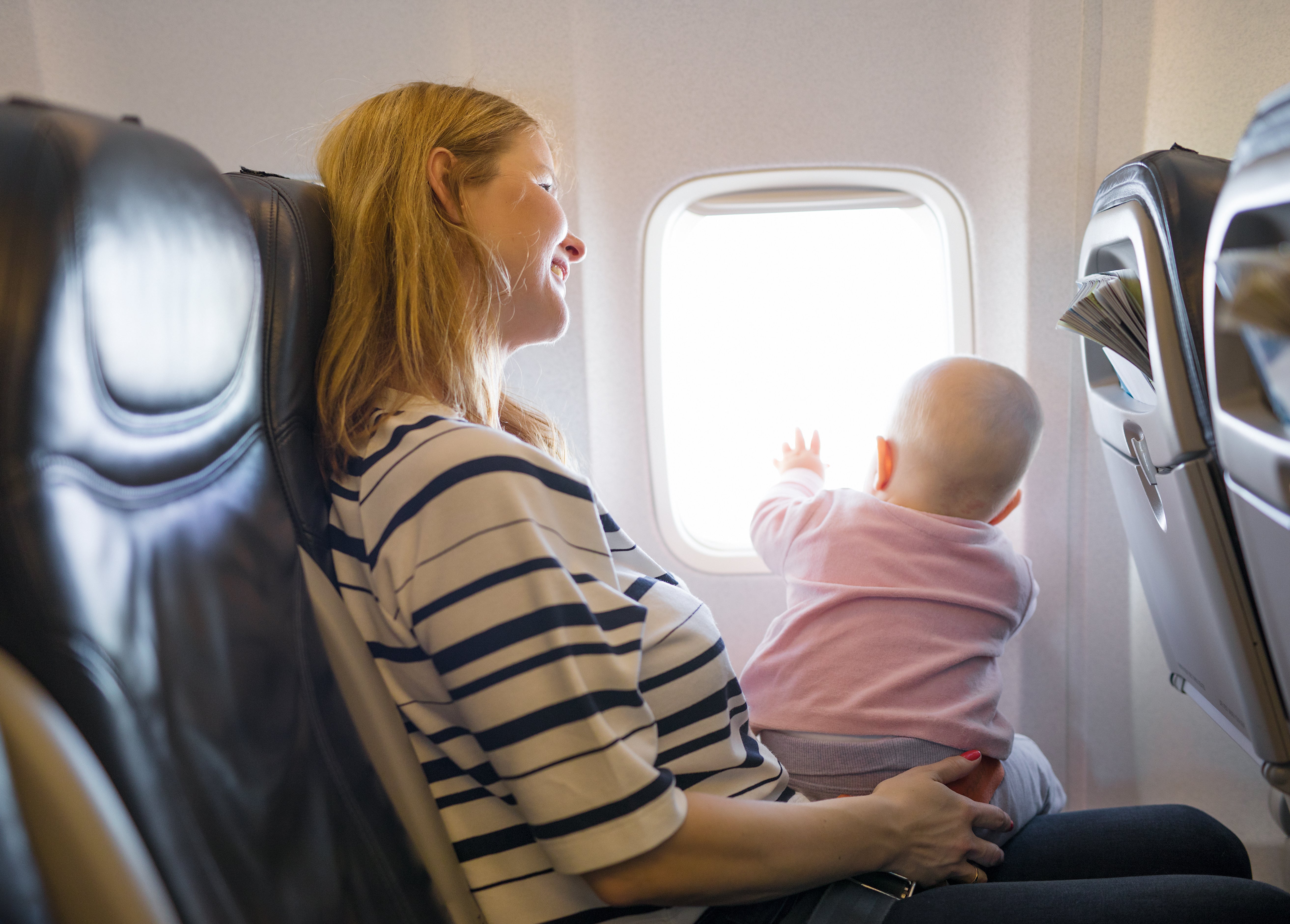 Flying with a Newborn: Airplane Travel & Security Tips