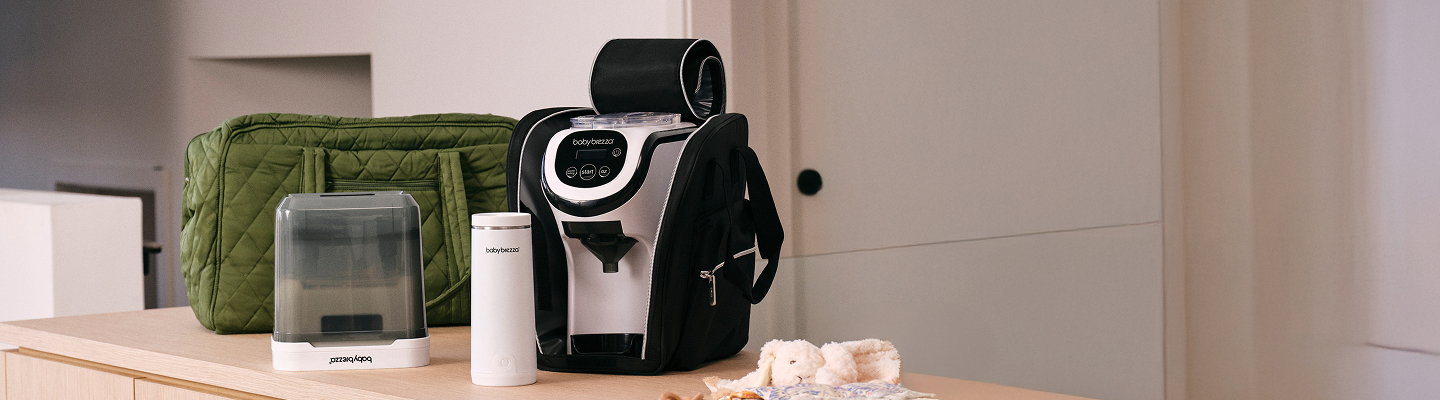 Baby formula maker setup, Portable baby bottle machine, Baby feeding equipment display