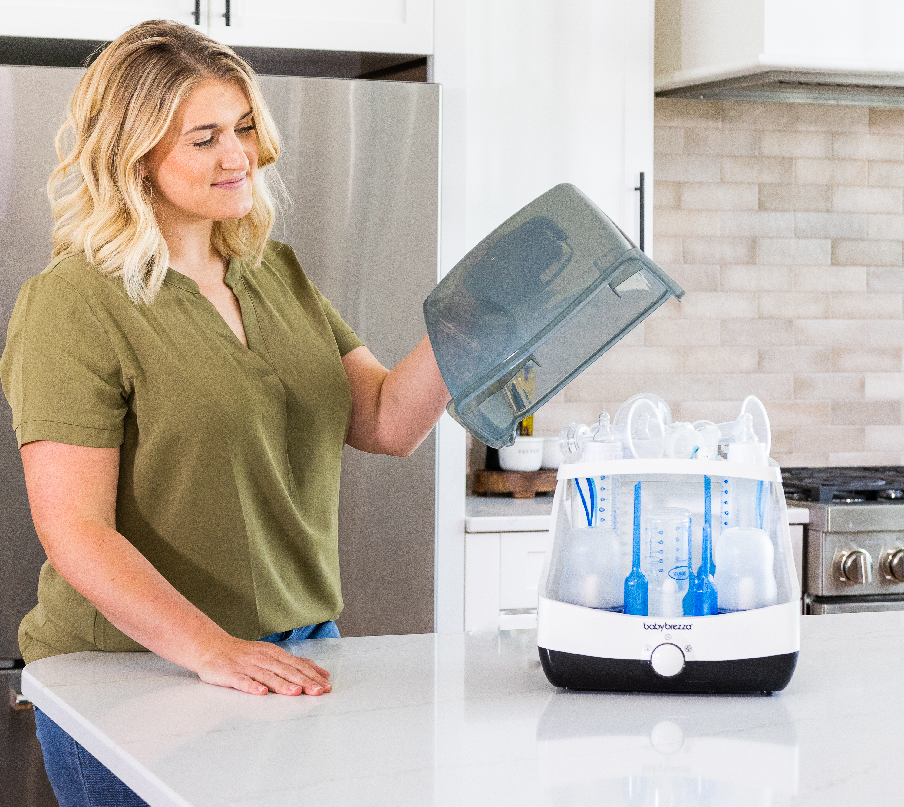 woman sterilizing breast pump parts
