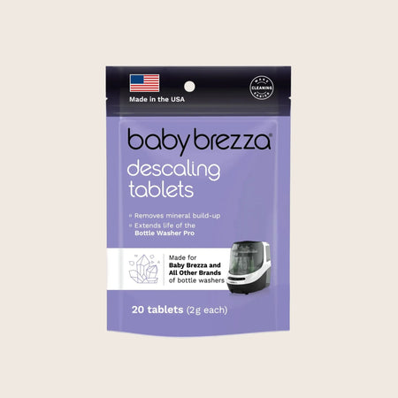 Package of Baby Brezza bottle washer pro descaling tablets on a light beige background