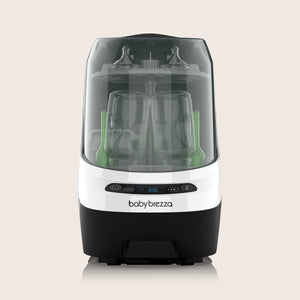 Baby Brezza bottle washer on a light beige background