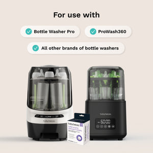 Two baby bottle washers on a light beige background with text reading 'For use with' and three checkmark labels: 'Bottle Washer Pro,' 'ProWash360,' and 'All other brands of bottle washers.' A small BabyBrezza box sits in front of the machines.