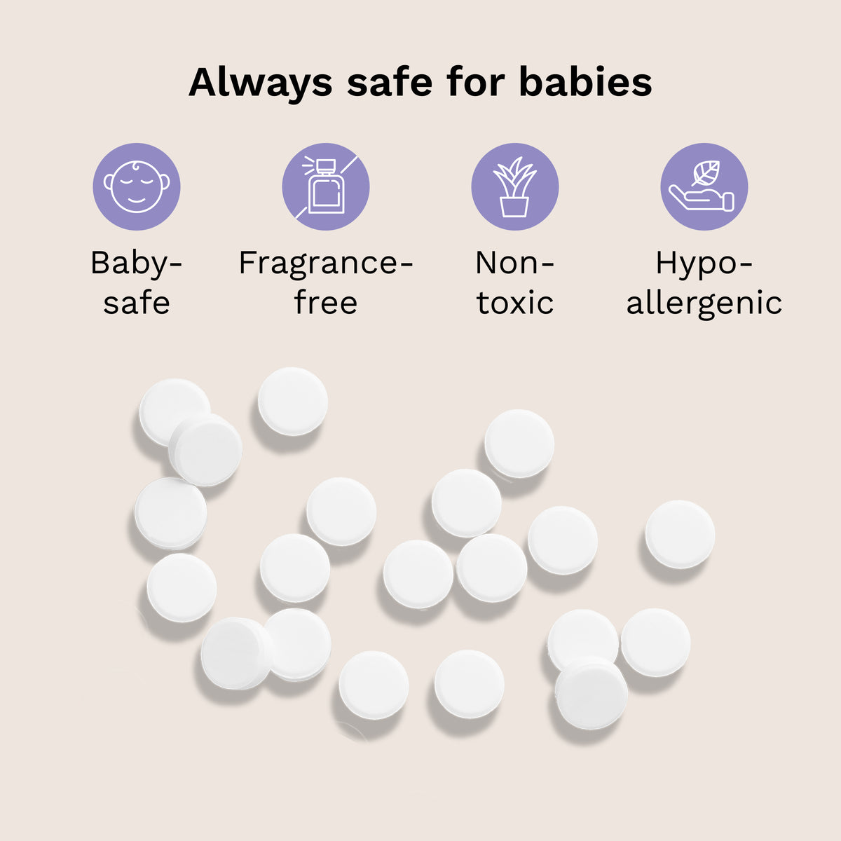 White round tablets scattered on a light beige background with text and icons stating 'Always safe for babies' and features like baby-safe, fragrance-free, non-toxic, and hypo-allergenic.