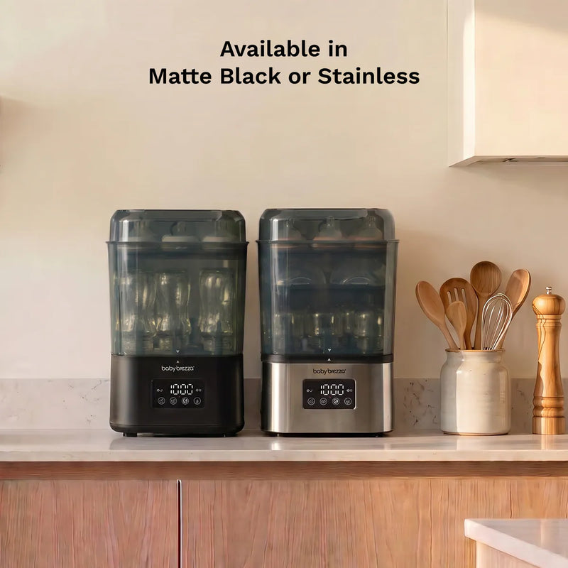 SuperQuick baby bottle sterilizer dryer in matte black and stainless steel on a kitchen countertop