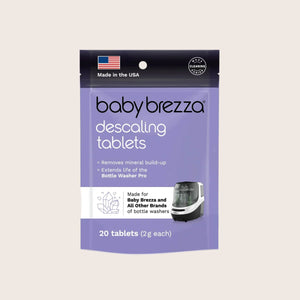 Package of Baby Brezza bottle washer pro descaling tablets on a light beige background