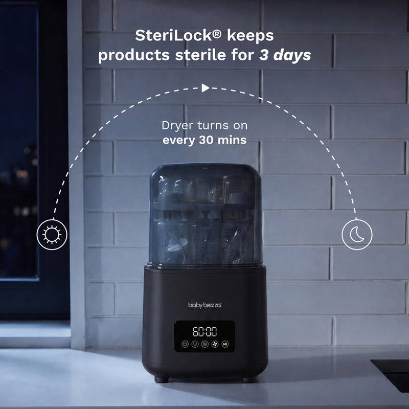 A baby bottle washer, sterilizer, and dryer sits on a kitchen counter against a gray subway tile wall. White text and dotted line graphics explain the SteriLock feature and drying schedule, with icons for sunlight and moon.