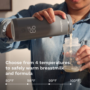 Person using a Baby Brezza portable warmer to warm breastmilk or formula with text "Choose from 4 temperatures to safely warm breastmilk and formula"