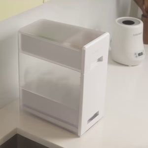 Upgrade how you dry and store your bottles, pump parts, and accessories with the Baby Brezza Covered Drying Rack and Organizer. Holds up to 8 bottles.  Quick drying with perforated bins. Drip tray slips out easily. Elevate your countertops while keeping your baby products organized, dry, and protected from germs.