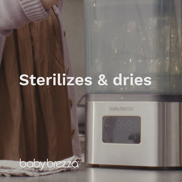 Load video: SuperQuick Baby Bottle Sterilizer and Dryer Video - Sterilizes &amp; Dries in just 10 Minutes
