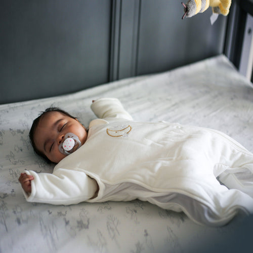 Baby sleeping in transition swaddle - product thumbnail