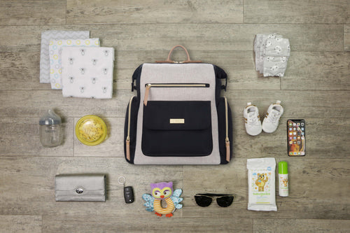 Martine stylish diaper bag surrounded by baby essentials - product thumbnail